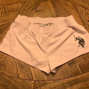 Goes over bathing suit bottoms or activewear. white shorts